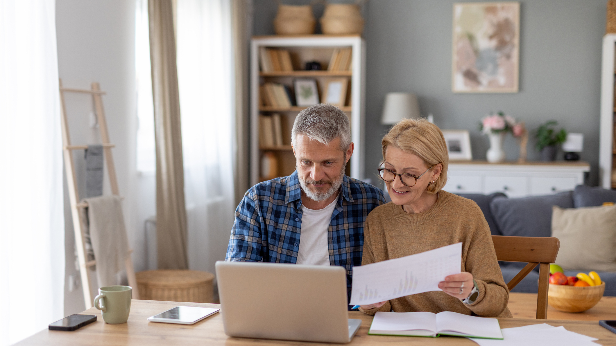 Couple Reviewing Documents Together at Home Office 2 iStock 2215139978 uai -Couple Reviewing Documents Together at Home Office | Piercefield Oliver