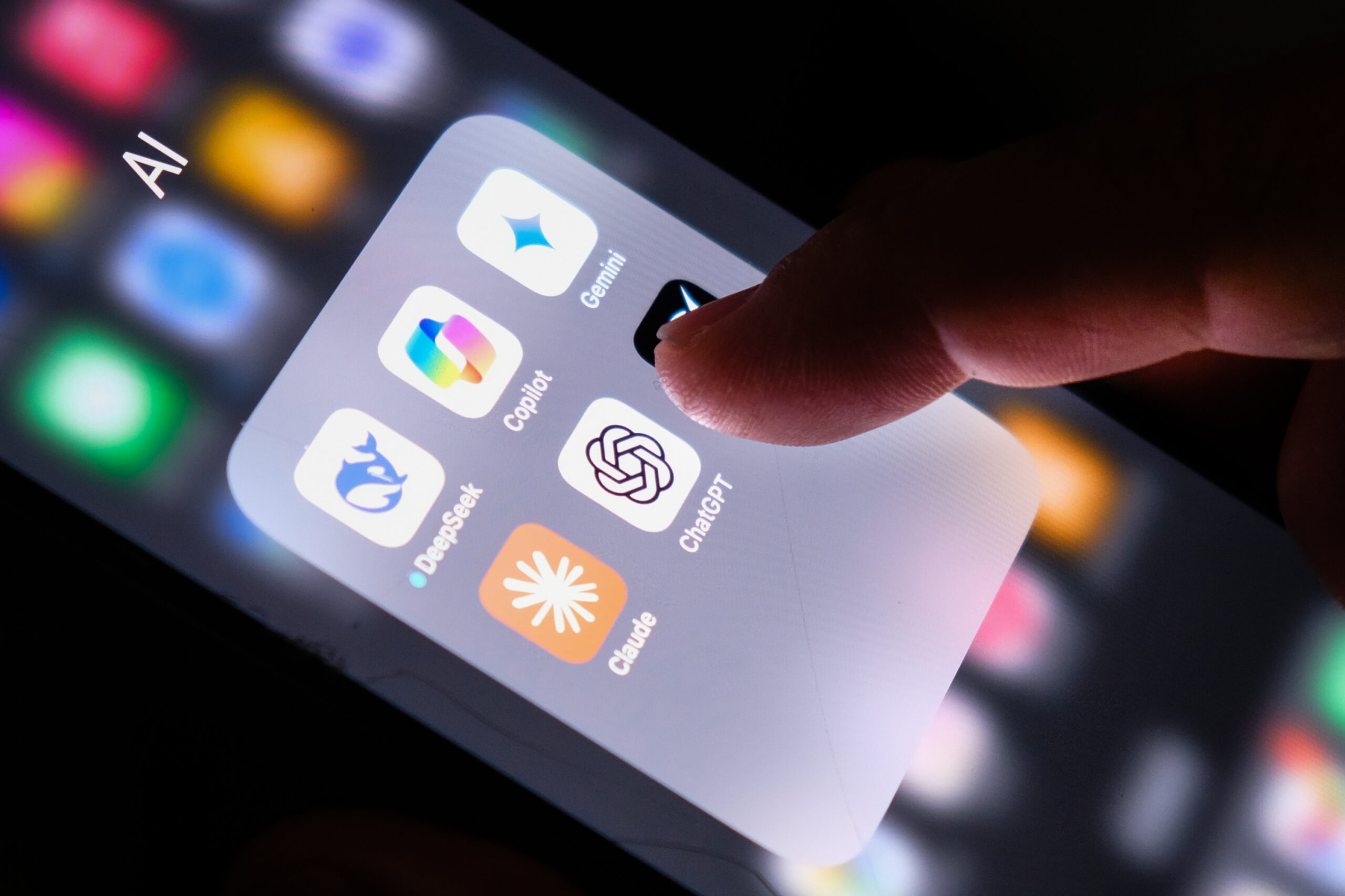 The Risks of Relying On AI for Financial Advice 18 AI platforms on smartphone